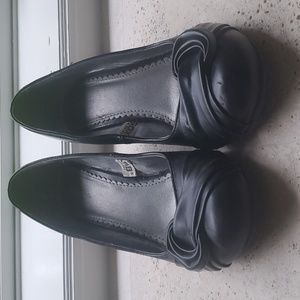 Black business, dress or everyday leather wedge.